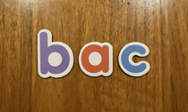 The letters 'b', 'a' and 'c'