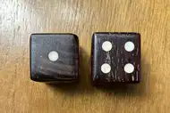Two dice. The first with the 1 side up, the second with the 4 side up