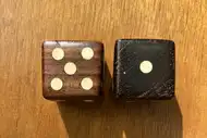 Two dice. The first with the 5 side up, the second with the 1 side up